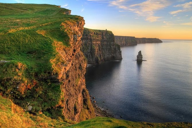 Sunset over the Cliffs of Moher, which face due west into the Atlantic