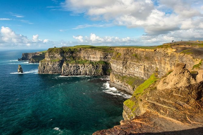 Late light on the Cliffs of Moher, the sea stack standing clear of the wall